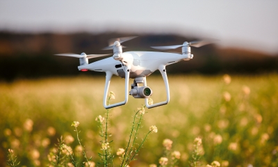 Drone,Quad,Copter,On,Yellow,Field