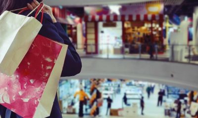 Woman,Holding,Shopping,Bags,In,The,Shopping,Mall