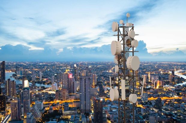 Telecommunication,Tower,With,5g,Cellular,Network,Antenna,On,Night,City