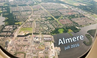 Theo_DM116_13. Luchtopname Almere + titels